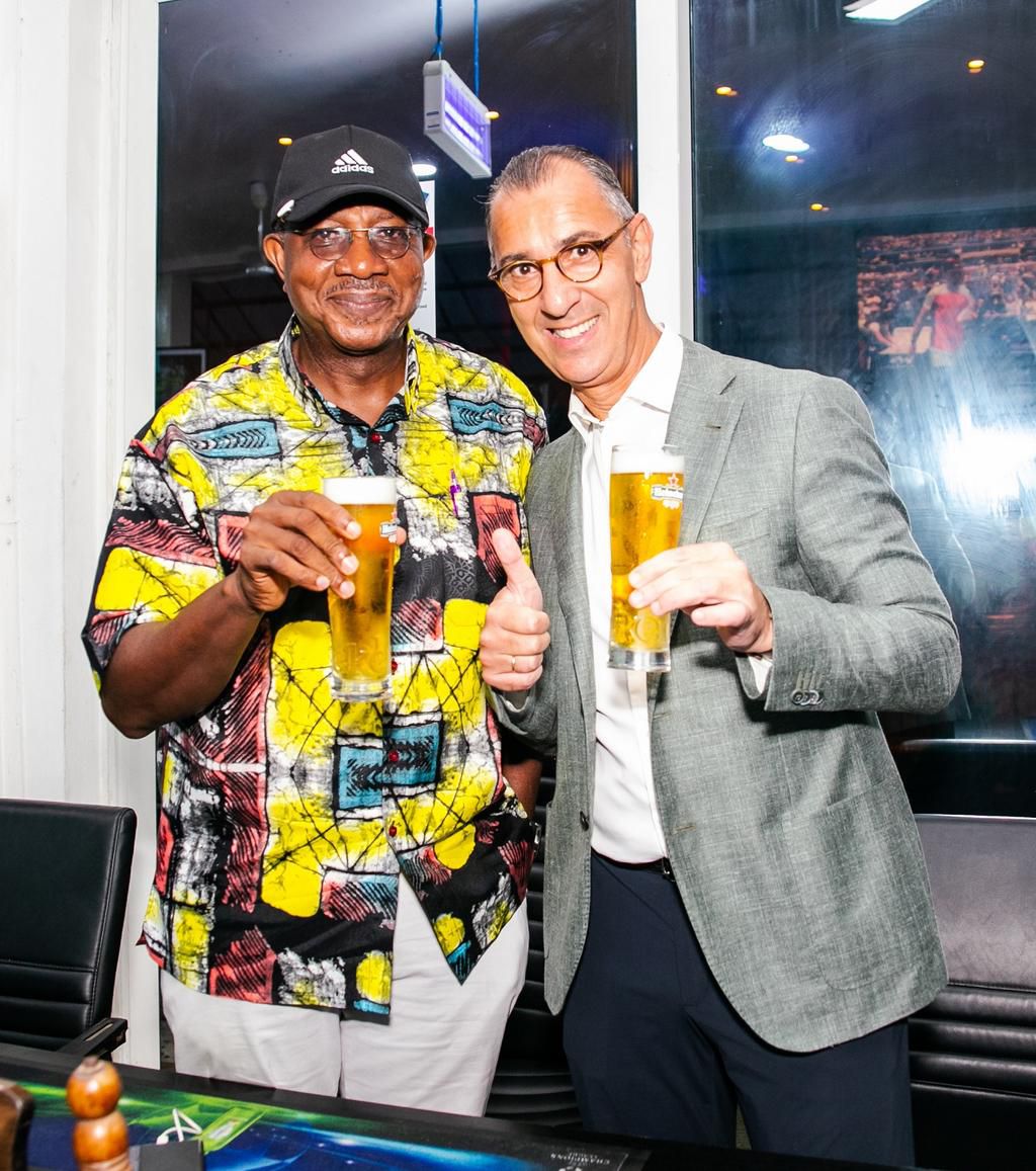 Dr Anthony Oboh,  Golf Captain, Ikoyi Club 1938 and Hans Essaadi, Managing Director, Nigerian Breweries PLC