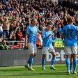 Phil Foden of Manchester City celebrates his goal with teammates after 0-3 score during the Premier League match Wolverhampton Wanderers vs Manchester City at Molineux, Wolverhampton, United Kingdom, 17th September 2022
