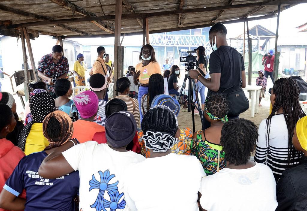 Team member from Girls with Period adressing the beneficiaries