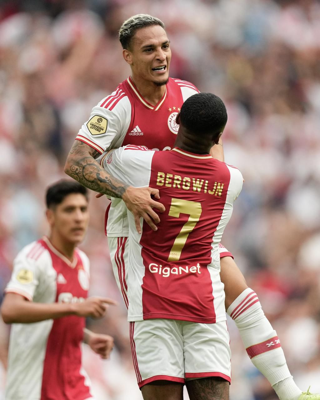 Antony and Bergwijn celebrate at the Arena.