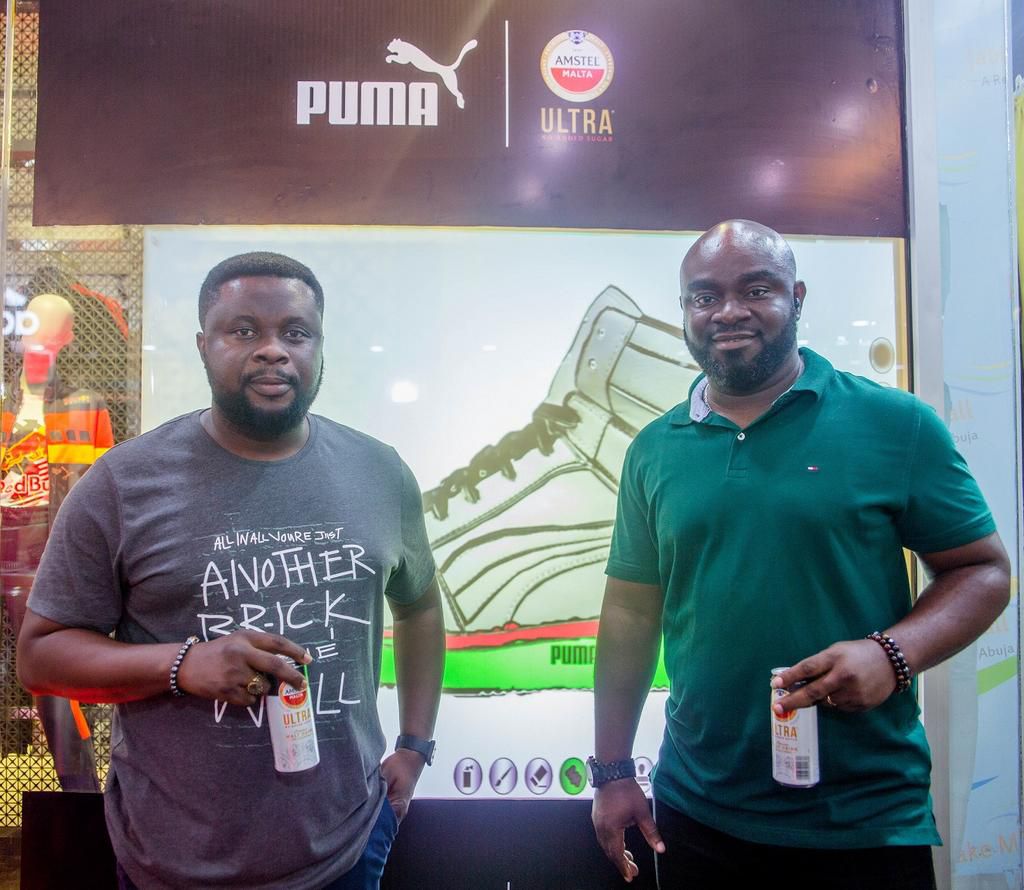 Olukayode Akintola, Senior Key Accounts Manager and Adebowale Adegun, Regional Trade Marketing Manager of Nigerian Breweries at the launch