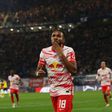 Leipzig midfielder Christopher Nkunku celebrates his goal against Dortmund