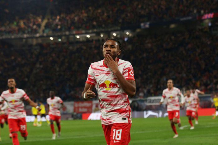 Leipzig midfielder Christopher Nkunku celebrates his goal against Dortmund