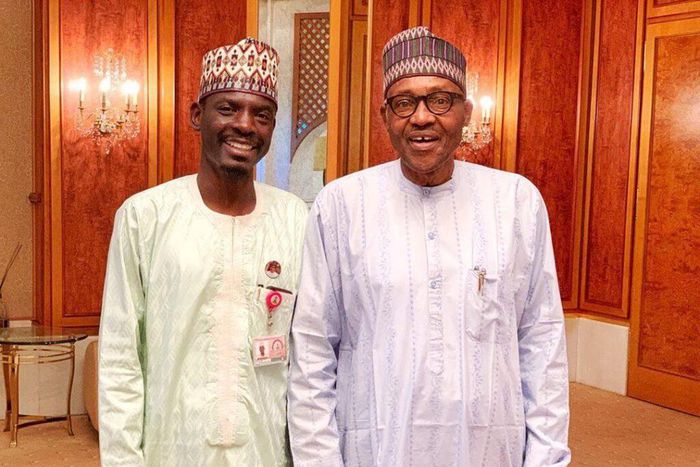 Bashir Ahmad poses in a photograph with President Muhammadu Buhari