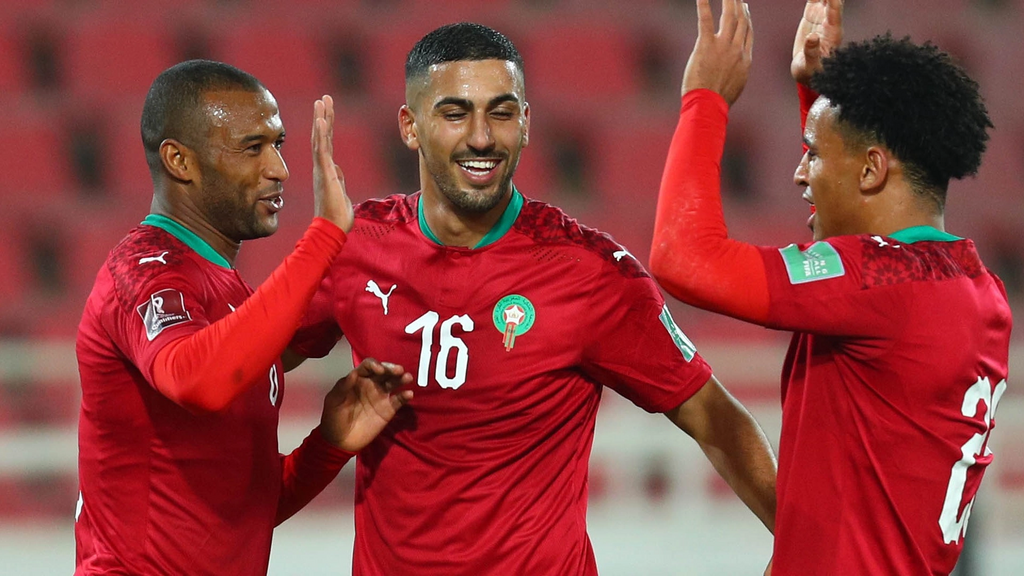 Ayoub El Kaabi of Morocco celebrates his goal with teammates Aymen Barkok