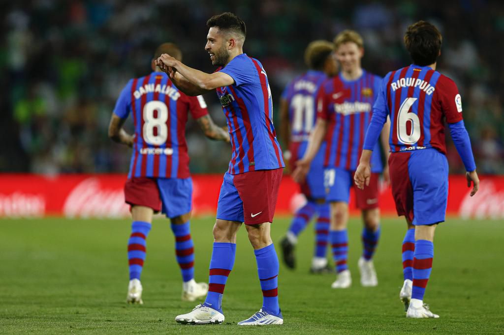 Barcelona edged out Real Betis 2-1 in La liga on Saturday to qualify for the Champions league next season