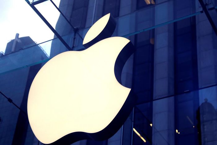 The Apple Inc. logo is seen hanging at the entrance to the Apple store on 5th Avenue in New York