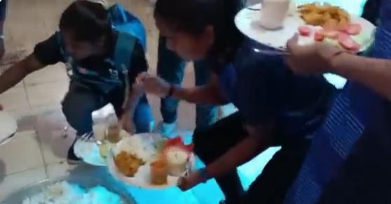 Disturbing video of young Indian Kabbadi players being served food in a toilet (screenshot)