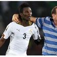 Asamoah Gyan and Avram Grant