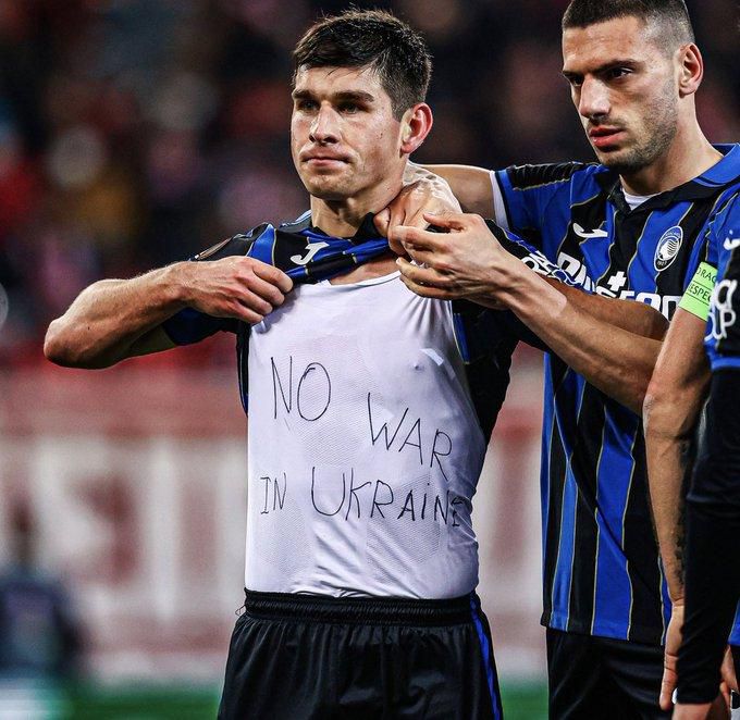 Atalanta's Ukrainian playmaker Ruslan Malinovsky was not booked by officials for removing his shirt to reveal this message