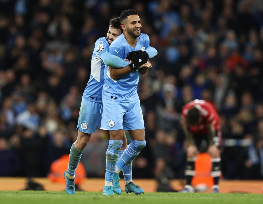RIyad Mahrez and Bernardo Silva celebrating the Algerian's goal