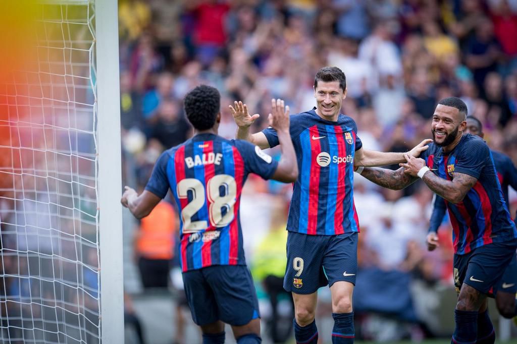 Alejandro Balde assisted two first half goals for Robert Lewandowski and Memphis Depay