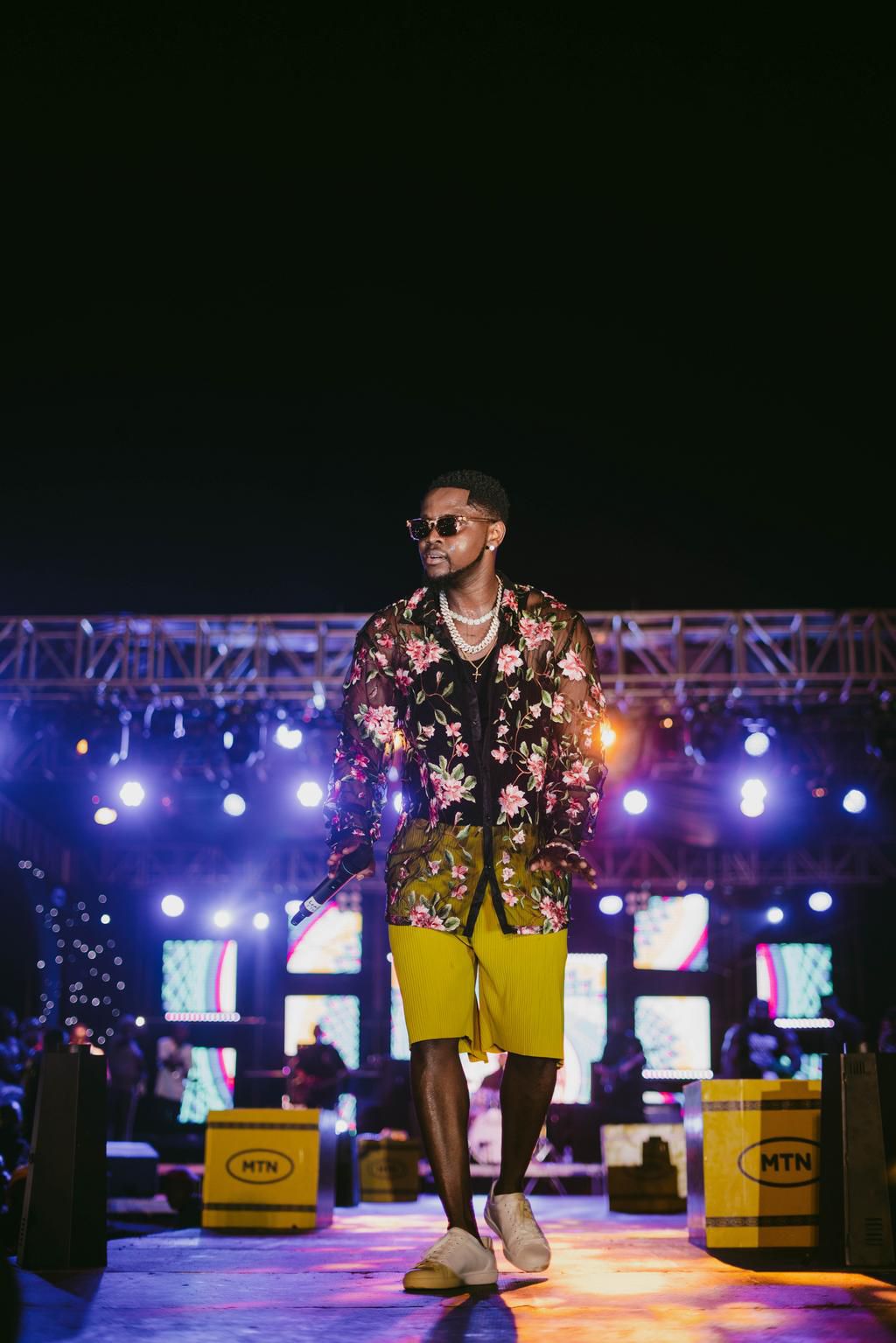 Kizz Daniel performing in Cotonou