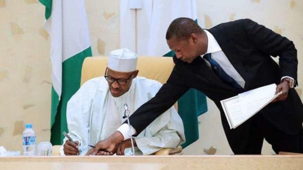 President Muhammadu Buhari and Minister of Justice and Attorney-General of the Federation, Abubakar Malami.
