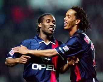 Jay-Jay Okocha pictured with Ronaldinho in 2002
