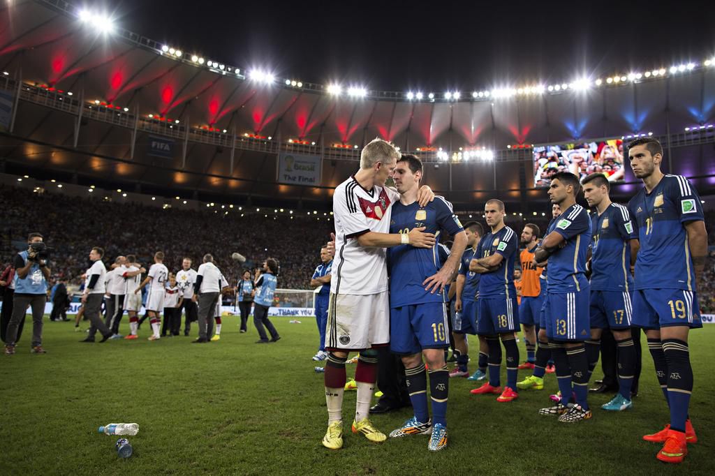 Lionel Messi is consoled by Bastian Schweinsteiger after the 2014 World Cup final ( Moritz Müller)