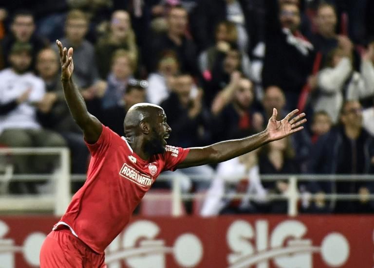 Julio Tavares had to wait for VAR before celebrating the goal that gave Dijon hope of avoiding relegation