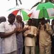 Representatives of defectors from the All Progressives Congress (APC) receiving umbrella of the People’s Democratic Party (PDP) in Benin on Friday.