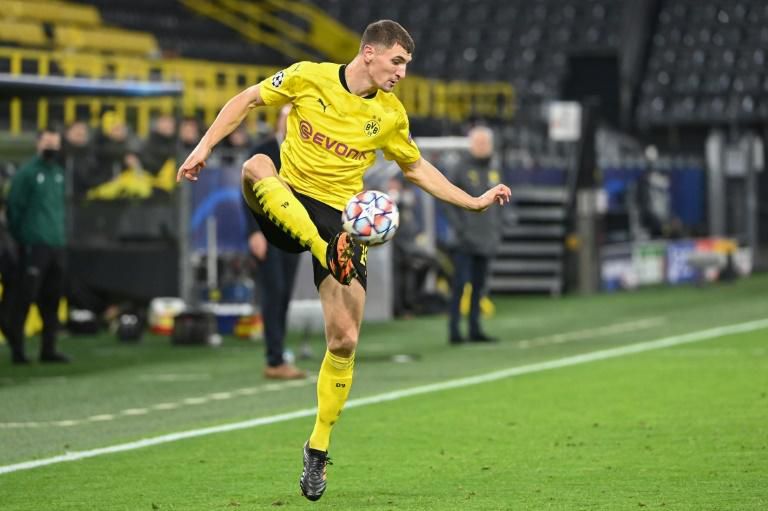 Borussia Dortmund defender Thomas Meunier misses Wednesday's key home Champions League game against Lazio with a calf injury