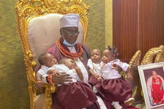 Oba of Benin Ewuare II with his quadruplets. [PM News]