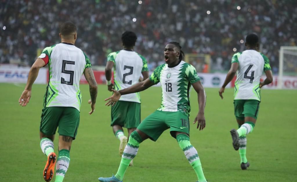 Super Eagles celebrate Ekong's goal