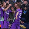 Harry Kane (left) celebrates after scoring Tottenham's third goal at Leeds