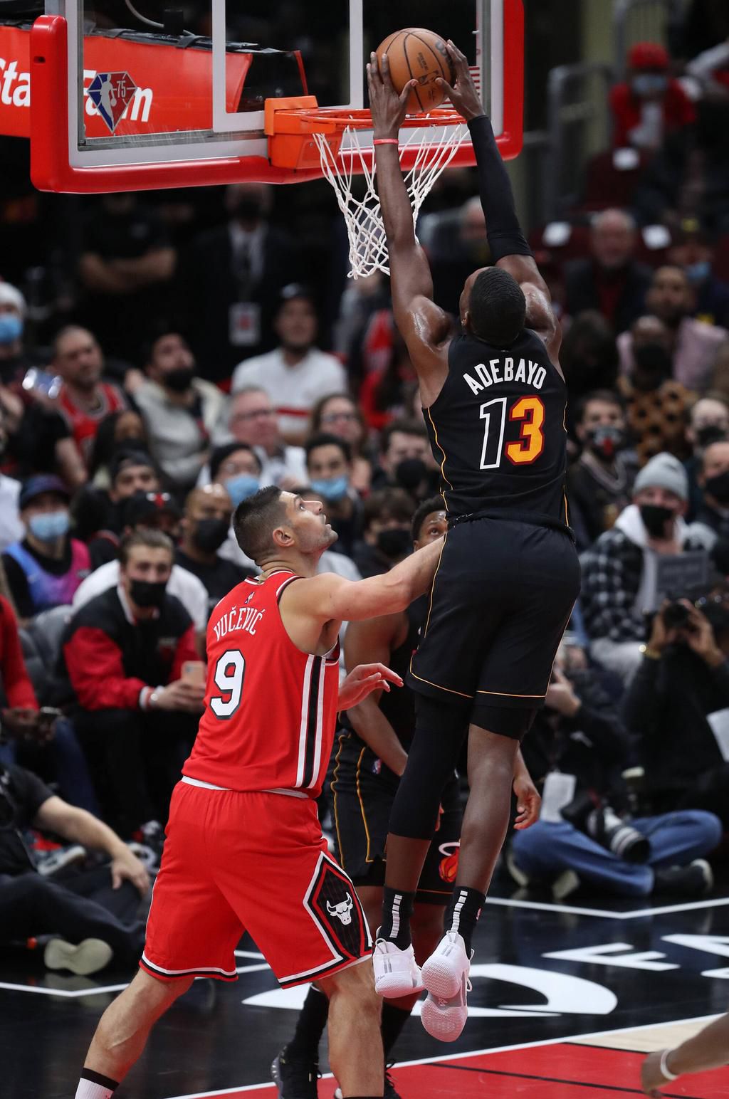 Miami Heat Center Bam Adebayo up against Chicago Bulls Center Nikola Vucevic