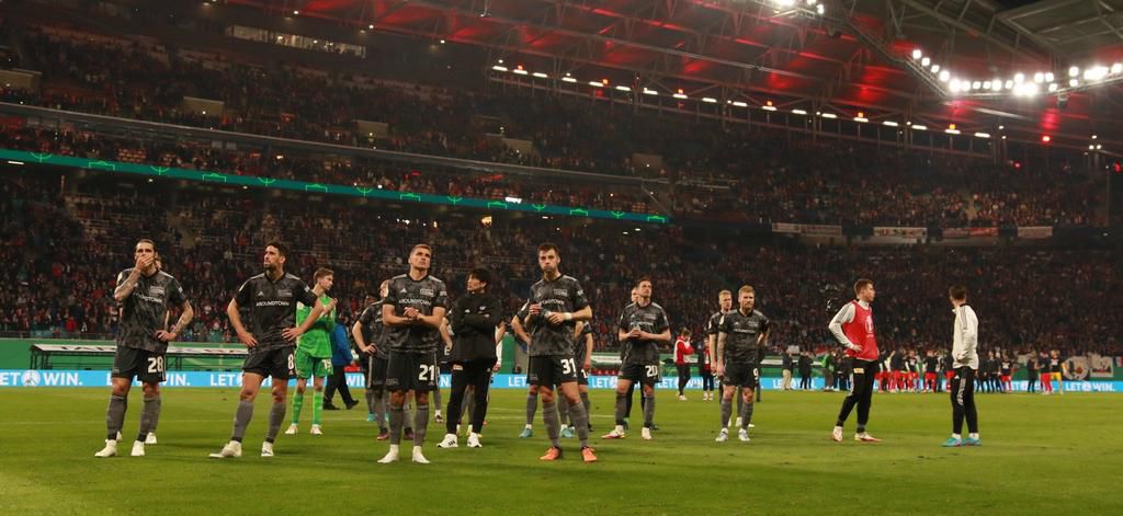 Dejected Union Berlin players after the game.