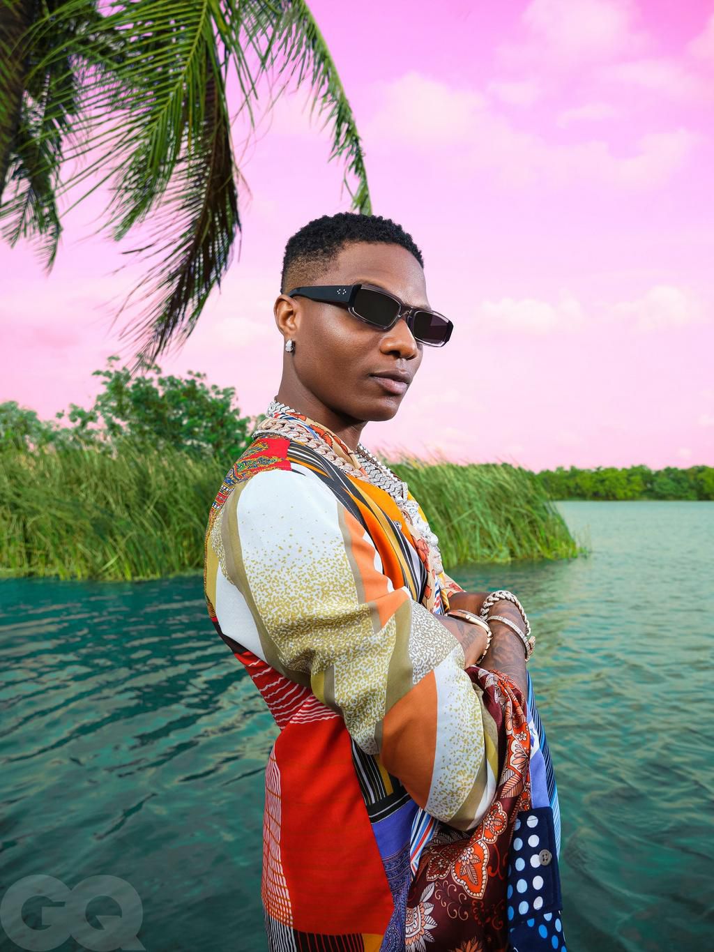 Wizkid wearing N Palmer shirts, pants from  Kiko Kostadinov and Jacquemus shades [GQ]