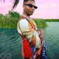 Wizkid wearing N Palmer shirts, pants from  Kiko Kostadinov and Jacquemus shades [GQ]