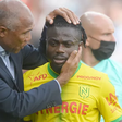 Nantes coach Antoine Kombouare and Moses Simon