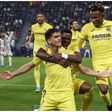 Samu Chukwueze celebrates with his Villarreal teammates.