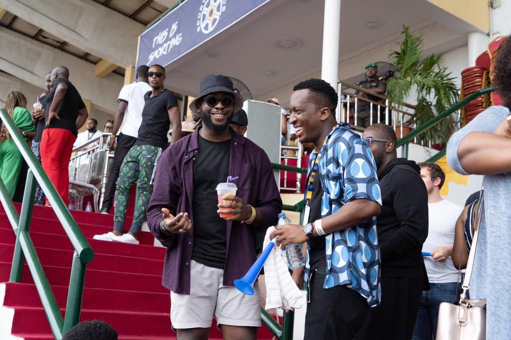 Sporting Lagos founder Shola Akinlade (R) has turned the Teslim Balogun stadium into a destination for young Nigerians