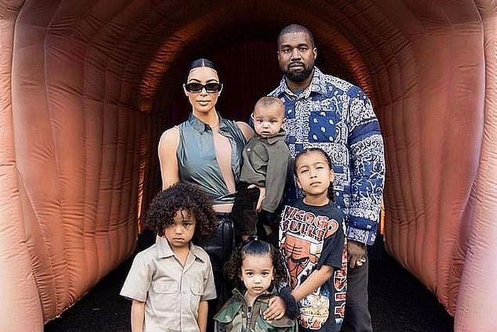 Kanye West, Kim Kardashian and their four children [Mirror]