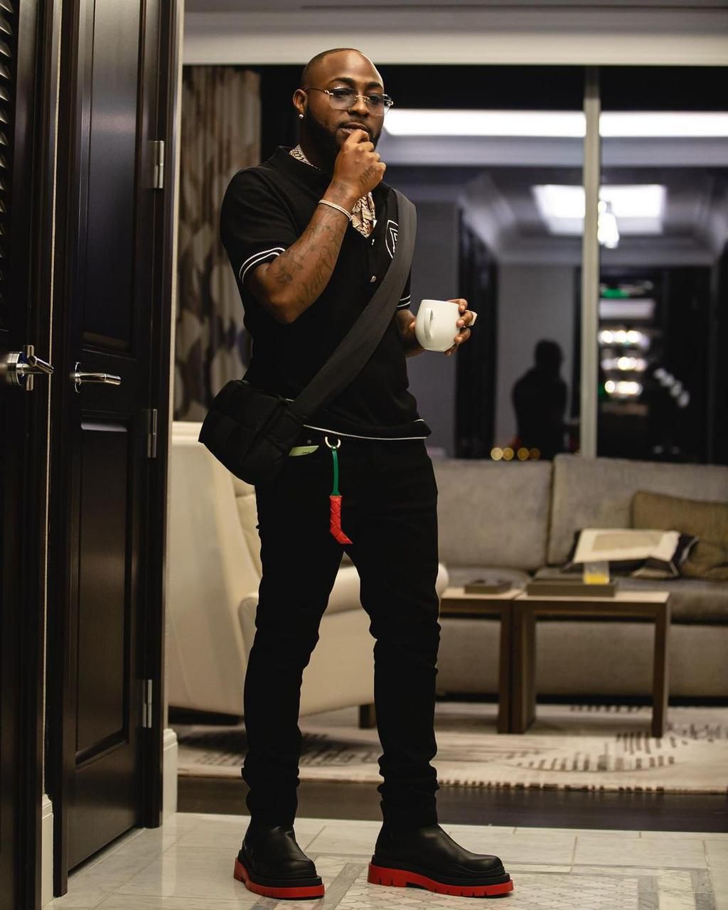 Davido wearing a Balmain polo [instagram/davido}