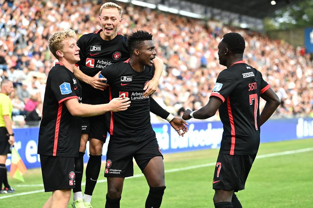 Midtjylland players celebrate a goal.