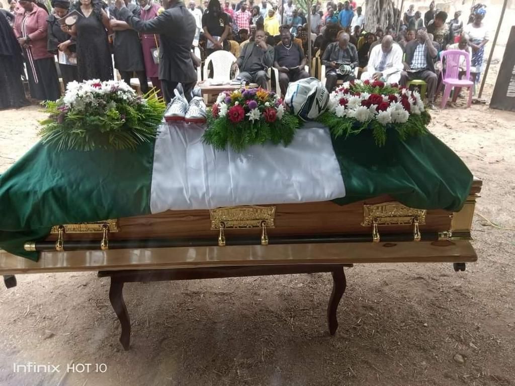 Tears flow as Ex-Super Eagles midfielder Justice Christopher is buried in Jos