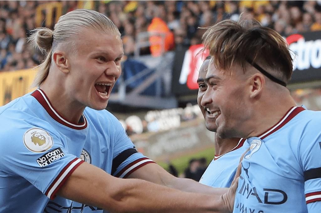Erling Haaland celebrate with Man City teammates