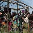 South Sudanese women and children queue to receive emergency food at the United Nations protection of civilians (POC) site 3 hosting about 30,000 people displaced during  fighting in Juba, South Sudan July 25, 2016. REUTERS/Adriane Ohanesian