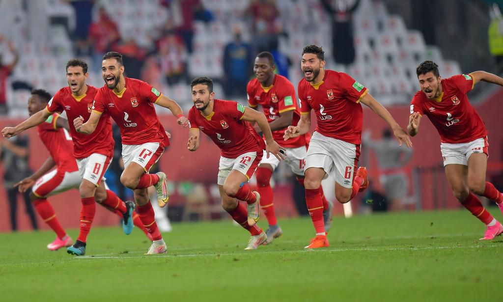 Al Ahly players celebrating the penalty shootout win in the third-place match against Palmeiras at Qatar 2020
