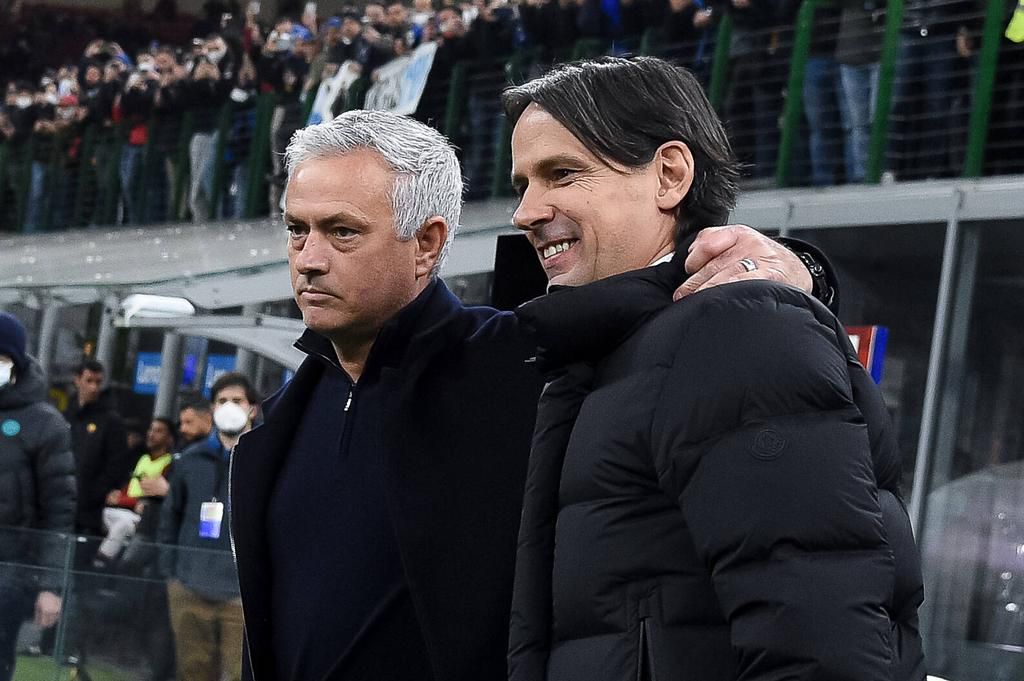 Simone Inzaghi manager of FC Internazionale shakes hands with Jose Mourinho manager of AS Roma
