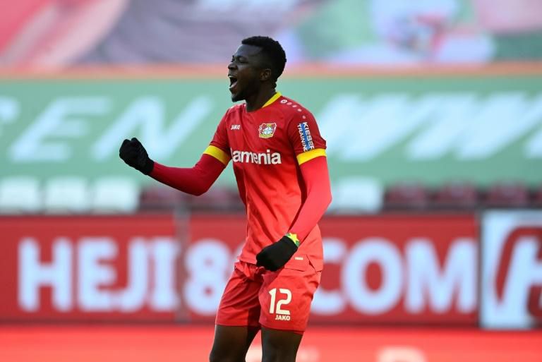 Edmond Tapsoba celebrates equalising for Bayer Leverkusen against Augsburg
