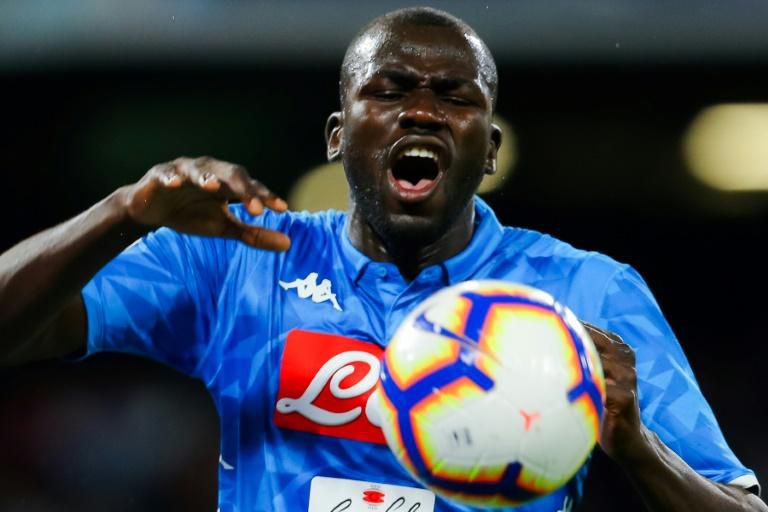 Napoli's Senegalese defender Kalidou Koulibaly reacts after missing a goal opportunity during the Italian Serie A football match Napoli vs Genoa on April 7, 2019 at the San Paolo stadium in Naples.