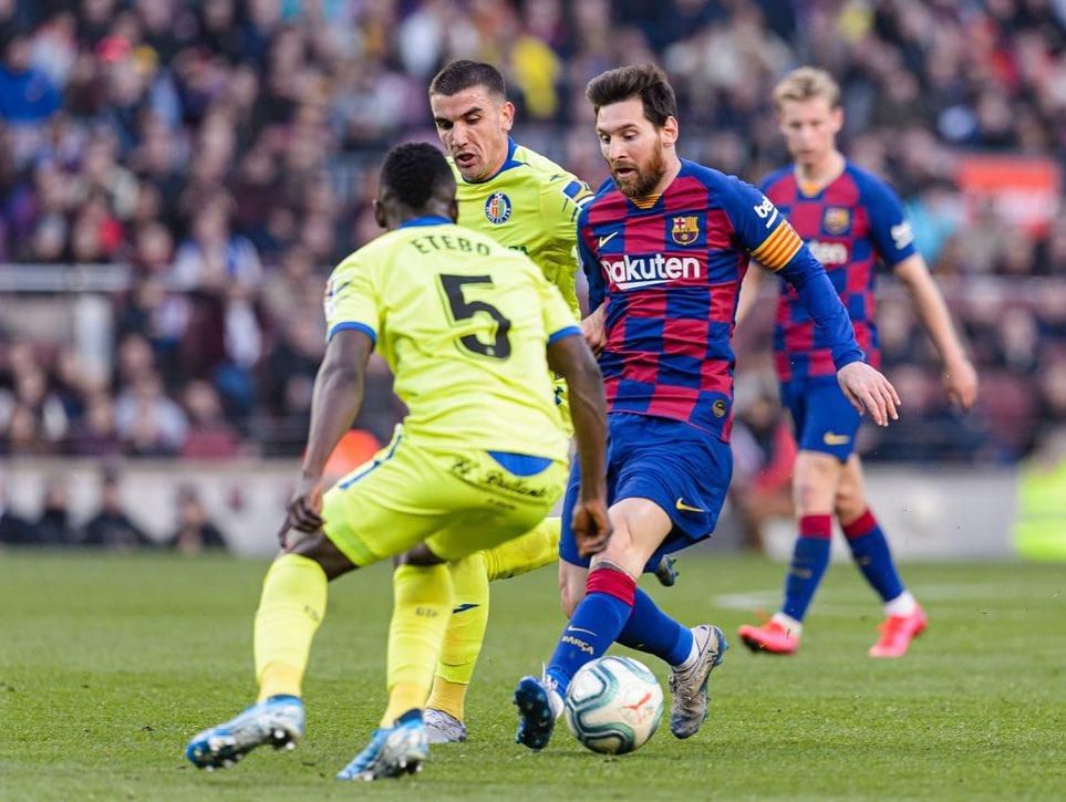 Oghenekaro Etebo and Lionel Messi (Getty Images)