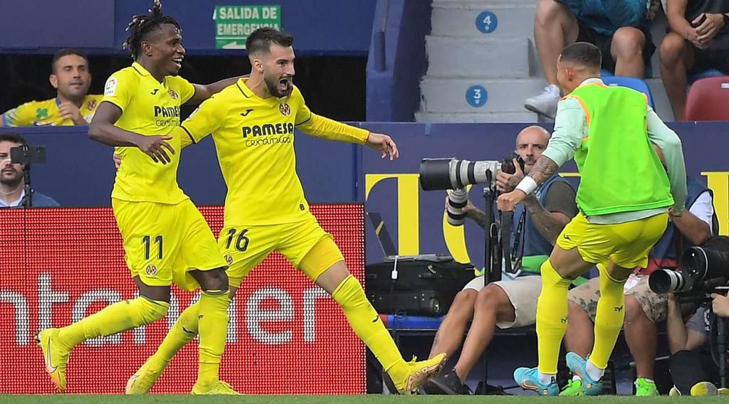 Samuel Chukwueze celebrates with Alex Baena, Villarreal’s sole scorer against Sevilla