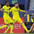 Samuel Chukwueze celebrates with Alex Baena, Villarreal’s sole scorer against Sevilla