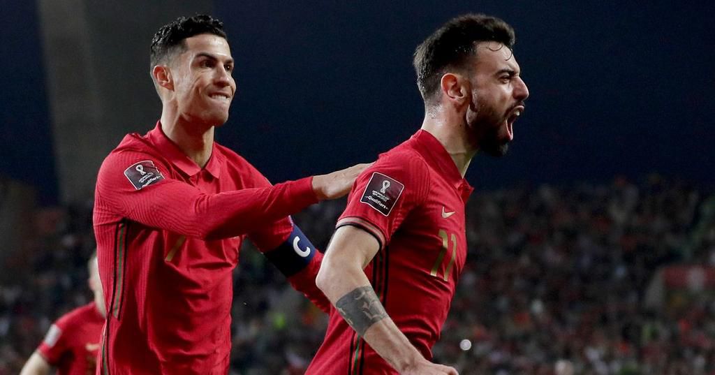 Cristiano Ronaldo celebrates with Portugal and Manchester United teammate Bruno Fernandes