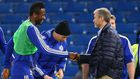 John Obi Mikel (L) and Roman Abramovich (R)