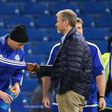 John Obi Mikel (L) and Roman Abramovich (R)