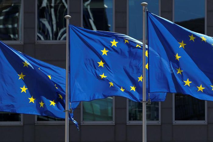FILE PHOTO: European Union flags flutter outside the European Commission headquarters in Brussels